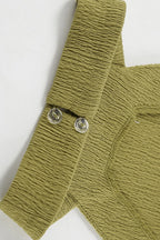 Green halter neck top and pleated wide-leg pants set