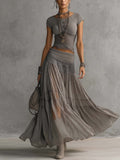 Top Grigio in Pizzo Trasparente con Pannelli e Set di Gonna Maxi Plissettata