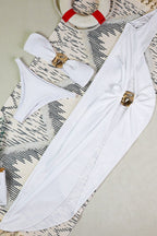 White three-piece swimsuit with ruching and high-cut leg
