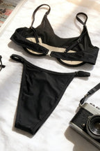Bikini Negro con Recortes, Tiras y Anillos Metálicos