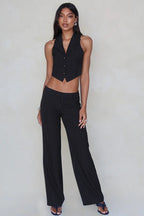 Conjunto de dos piezas a rayas con cuello en V: chaleco y pantalones holgados