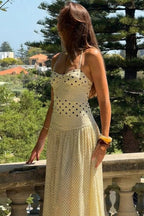Retro style halter maxi dress with polka dots, patchwork, and ruching