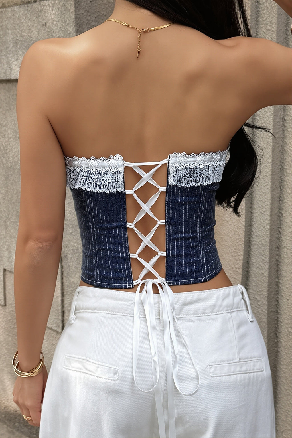 Top corsé de rayas sin tirantes con lazada