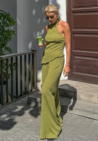 Green halter neck top and pleated wide-leg pants set