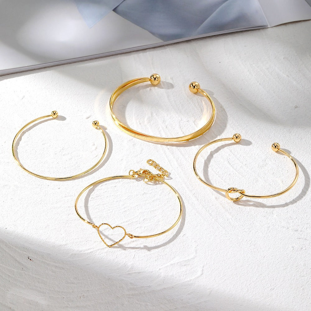 4-Pieza Creative Heart Crossed Aleación Brazalete Set