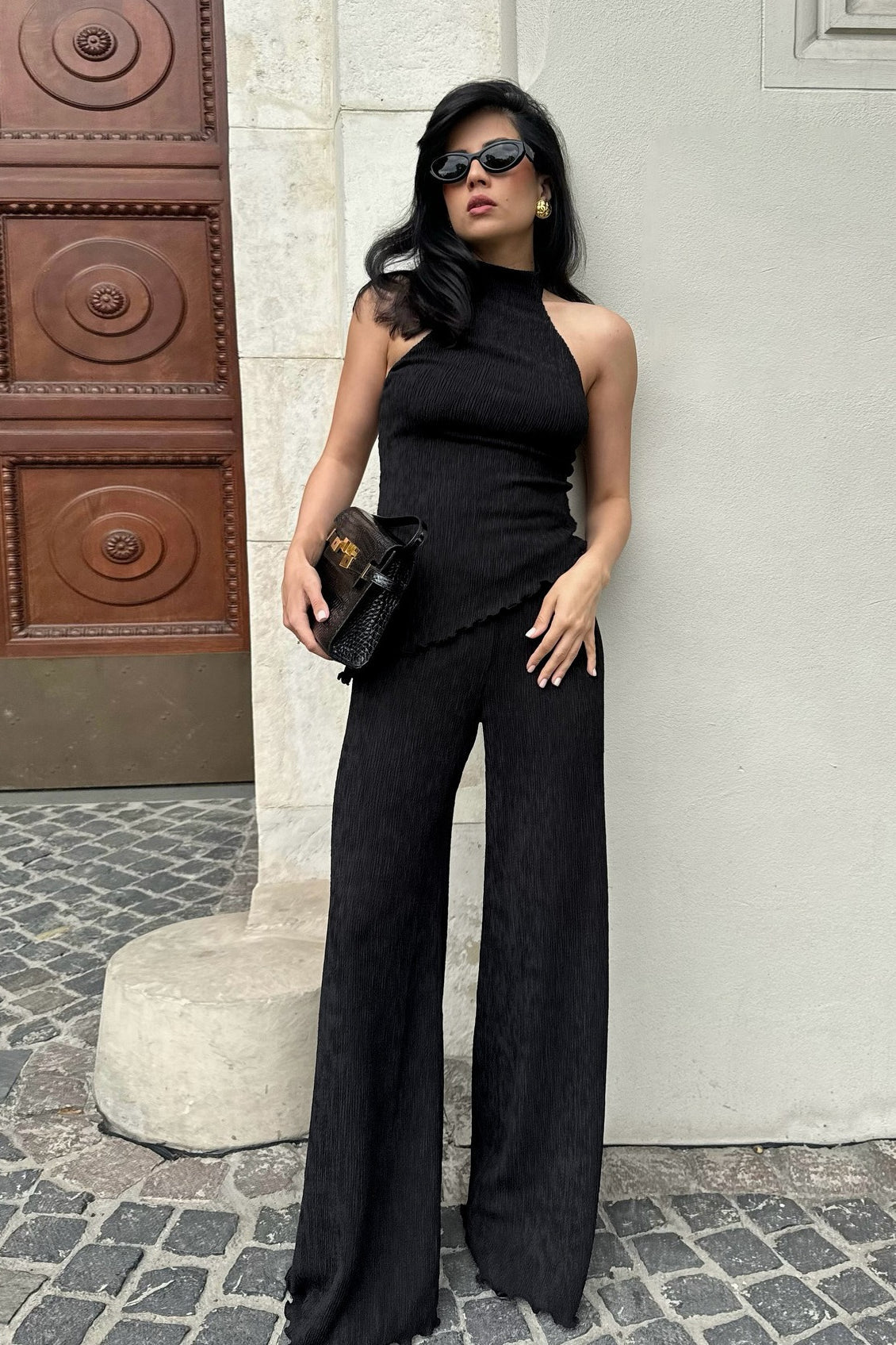 Green halter neck top and pleated wide-leg pants set