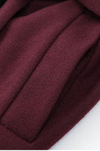 Abrigo largo liso con elegante cuello bufanda