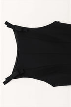Casual sleeveless top with a tie detail at the hem and a sweet style