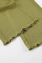 Green halter neck top and pleated wide-leg pants set