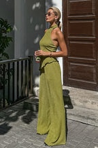 Green halter neck top and pleated wide-leg pants set