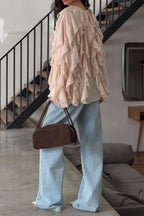 Loose casual blouse with ruffles and open front tie