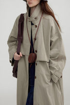 Long vintage-style coat with a high collar