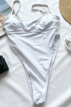 Bañador de una pieza con cuello halter, espalda descubierta y corte alto en la pierna