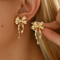 Elegante Golden Lazo Aretes Colgantes