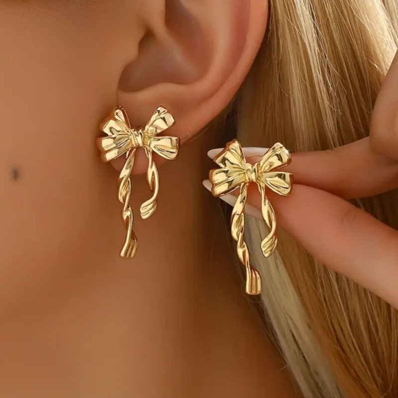 Elegante Golden Lazo Aretes Colgantes