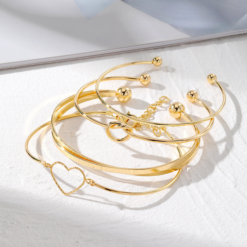 4-Pieza Creative Heart Crossed Aleación Brazalete Set