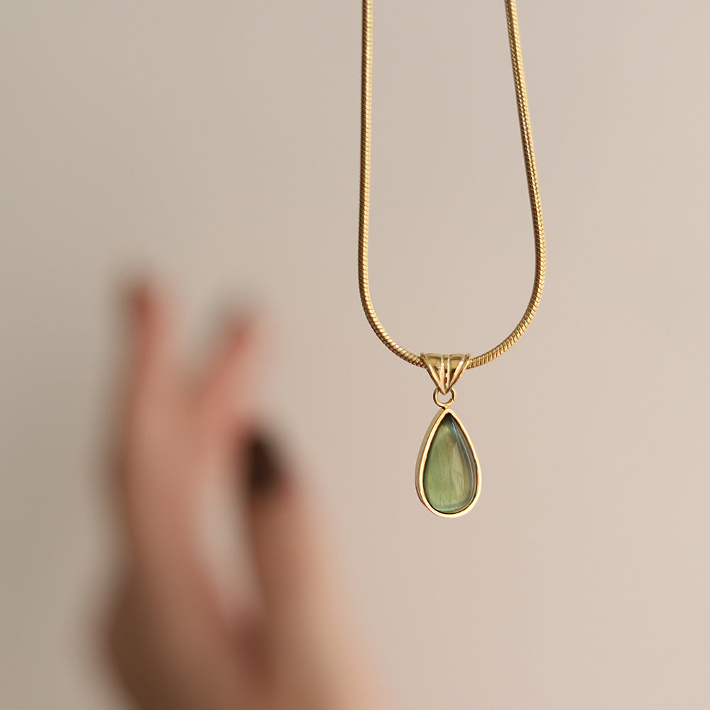 Aqua Lágrima Pendant Acero de Titanio Bañado en Oro Collar