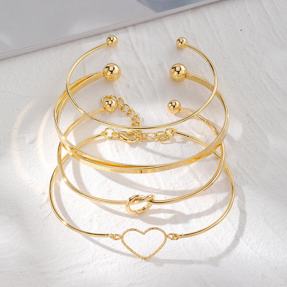 4-Pieza Creative Heart Crossed Aleación Brazalete Set