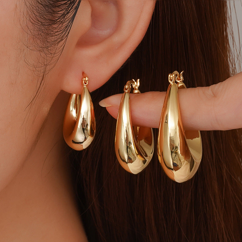 Bañado en Oro Hollow Forma de U Ovalado Latón Aretes