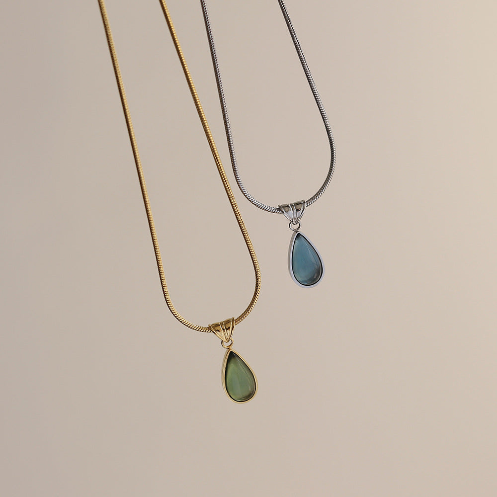 Aqua Lágrima Pendant Acero de Titanio Bañado en Oro Collar