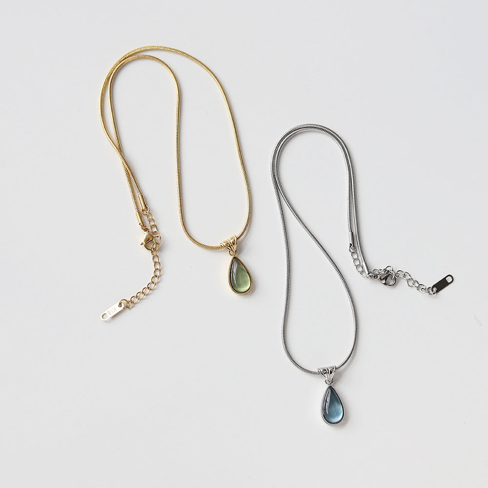 Aqua Lágrima Pendant Acero de Titanio Bañado en Oro Collar