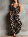 Roberta · Tuta ampia in chiffon nera con stampa animalier, scollo a halter e pantaloni a palazzo