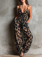 Roberta · Conjunto holgado de gasa negra con estampado animal, escote halter y pantalones palazzo