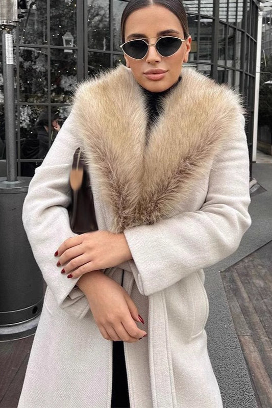 Elegant long coat with fur collar, crafted in a wool blend