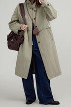 Long vintage-style coat with a high collar