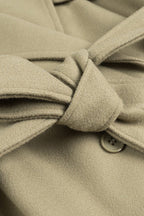 Single-breasted coat with wide notch lapel