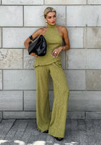 Green halter neck top and pleated wide-leg pants set