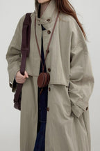 Long vintage-style coat with a high collar