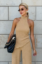 Green halter neck top and pleated wide-leg pants set