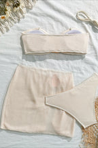 Conjunto de baño de tres piezas con minifalda de tiras lisas