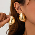 Liquid Irregular Fruncido Round Aretes
