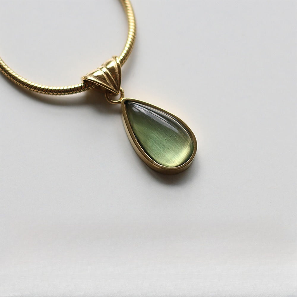 Aqua Lágrima Pendant Acero de Titanio Bañado en Oro Collar