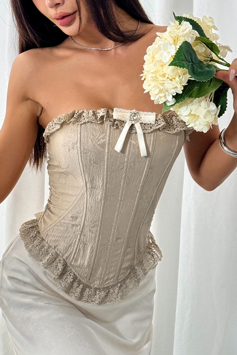 Blusa corsé sin tirantes con varillas y volantes de encaje