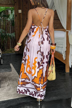 Vestido largo boho vintage con estampado floral en tonos naranja y marrón